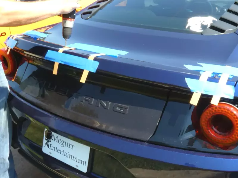 How to Install a Spoiler on a Car
